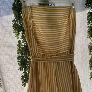 Yellow strapless striped jumpsuit